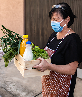 Woman working at food pantry.