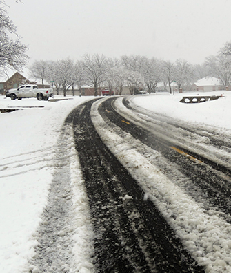 snow covered icy road